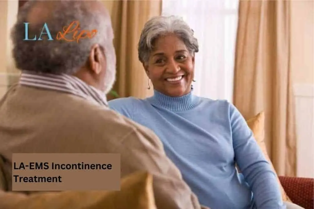 Couple sat smiling at each other - LA-EMS treatment Epping Green