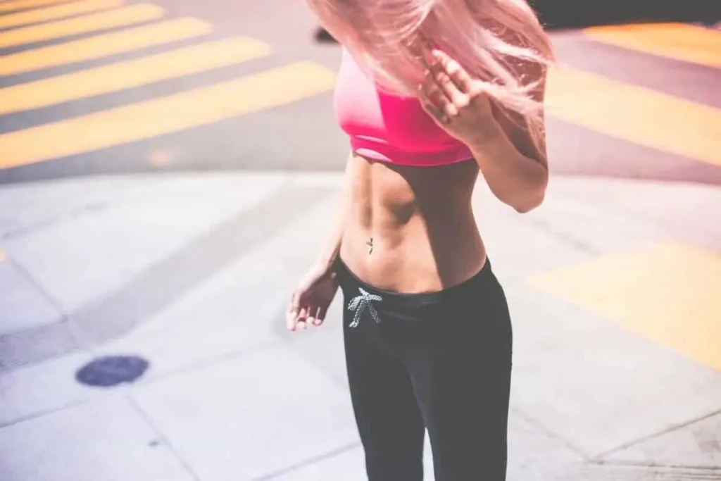 Woman with toned stomach after LA-EMS Body Sculpting Treatment Epping Green